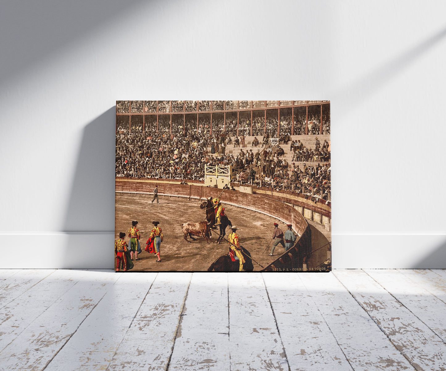 A picture of A bull fight, Barcelona, Spain, a mockup of the print leaning against a wall