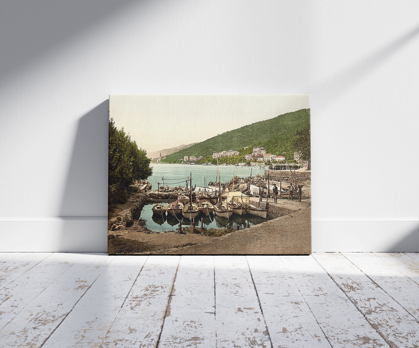 A picture of Abbazia, small harbor, Istria, Austro-Hungary, a mockup of the print leaning against a wall