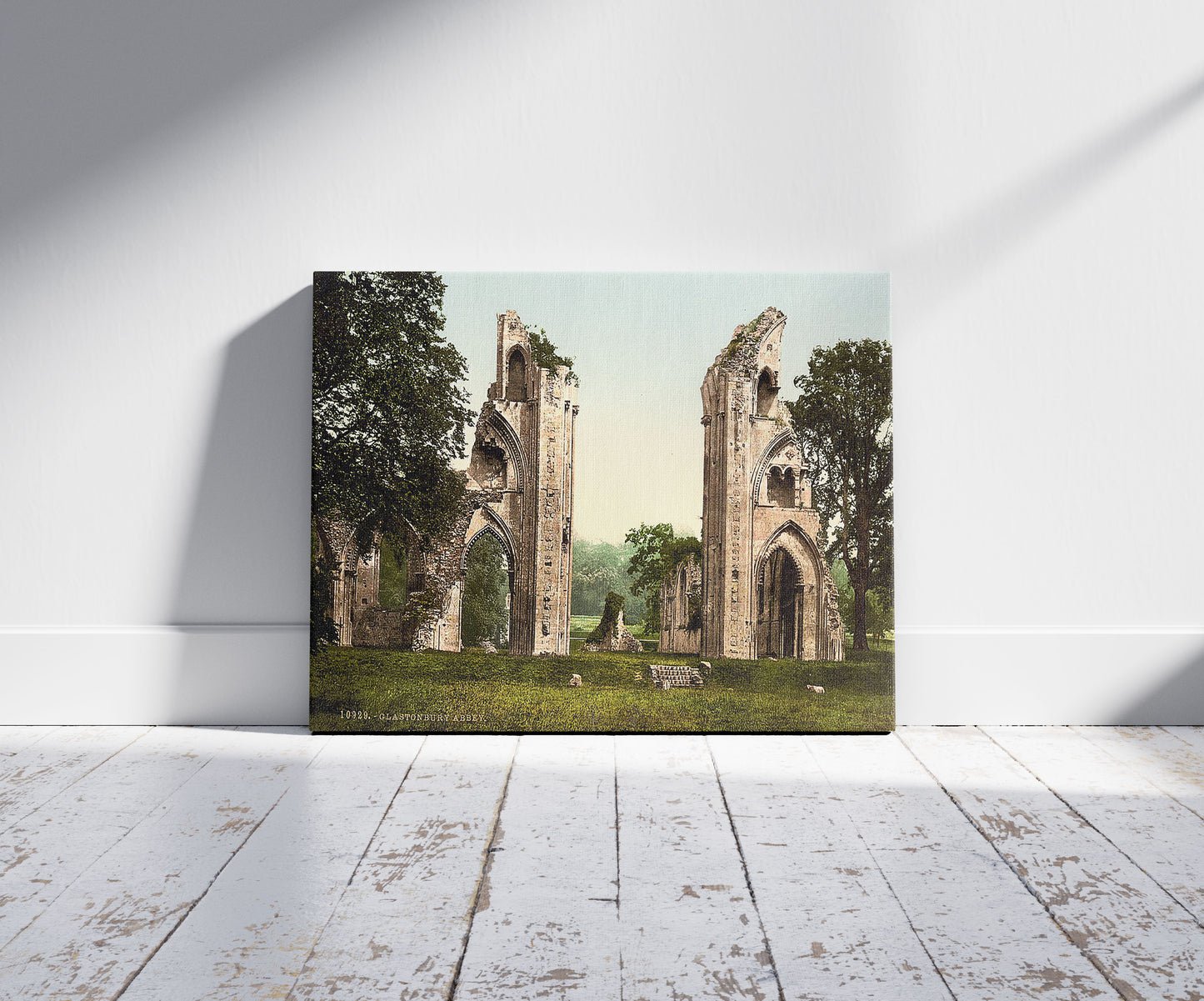A picture of Abbey, Glastonbury, England, a mockup of the print leaning against a wall