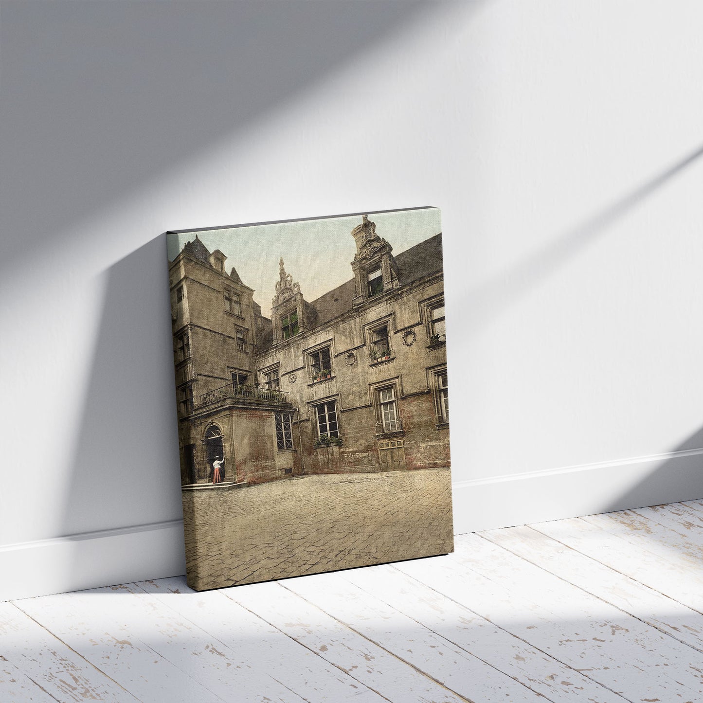 A picture of Ancient house of XVI century, Caen, France, a mockup of the print leaning against a wall