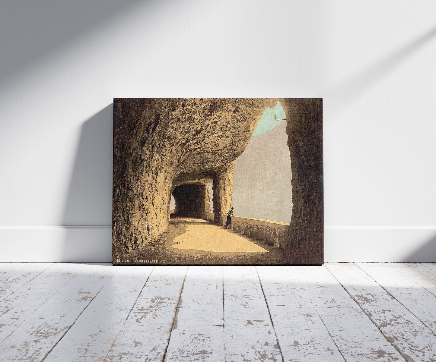 A picture of Axenstrasse, view on the lake, Lake Lucerne, Switzerland, a mockup of the print leaning against a wall