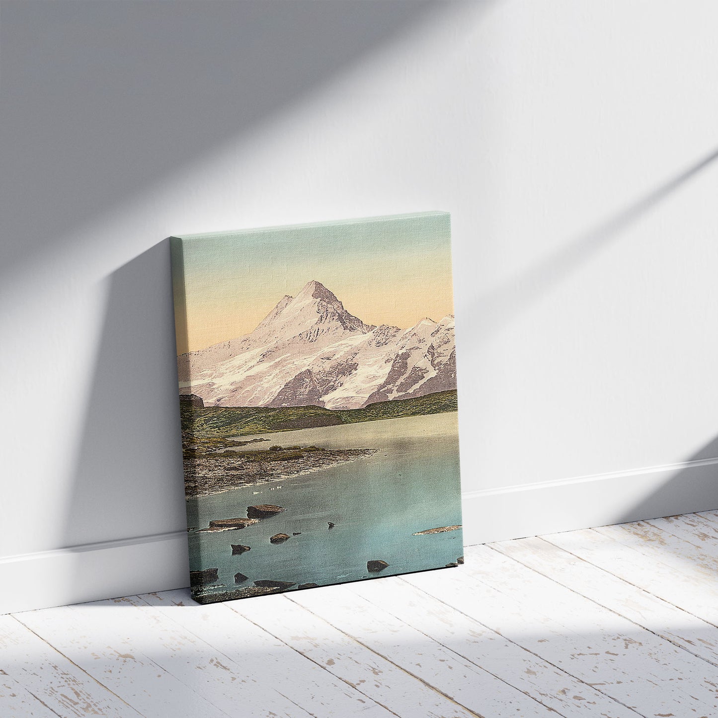A picture of Bach Alps Lake and Schreckhorn, Bernese Oberland, Switzerland, a mockup of the print leaning against a wall