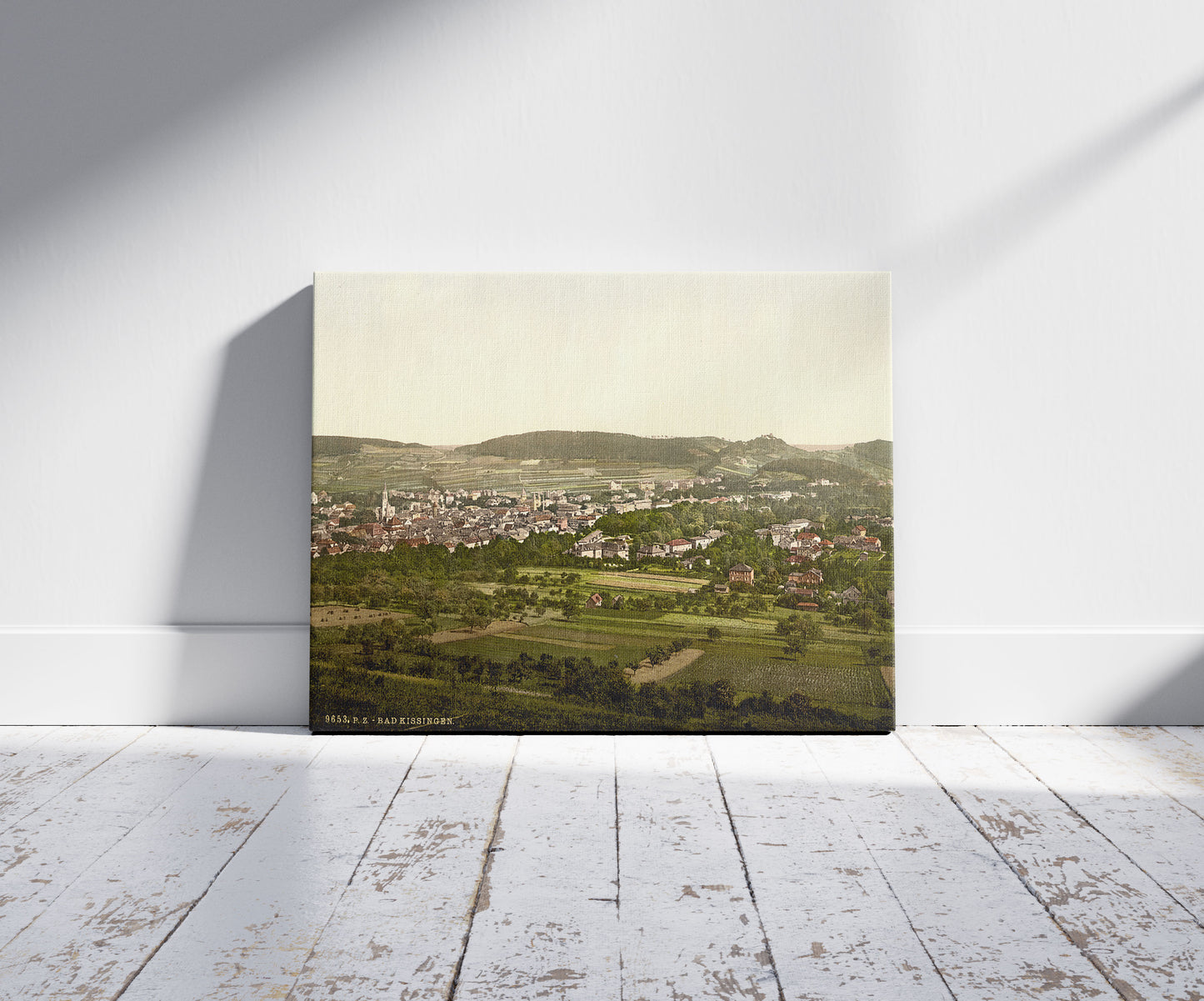 A picture of Bad Kissengen (i.e. Bad Kissingen), general view, Bavaria, Germany, a mockup of the print leaning against a wall
