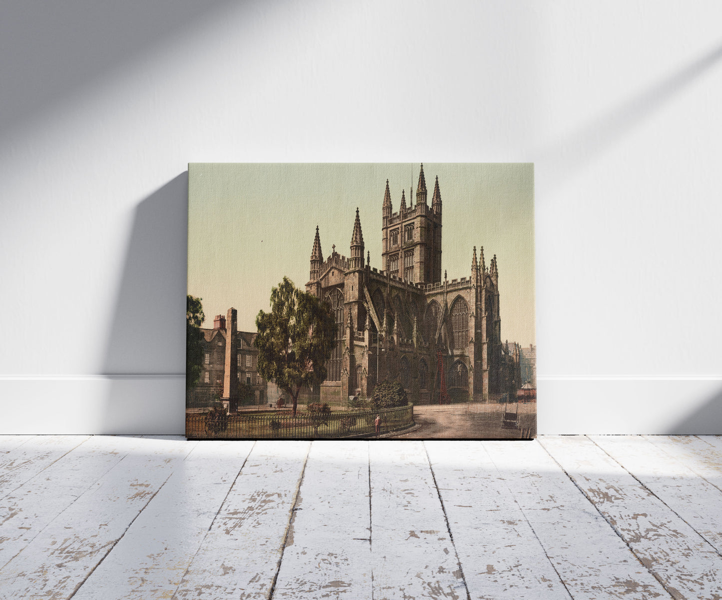 A picture of Bath Abbey, a mockup of the print leaning against a wall