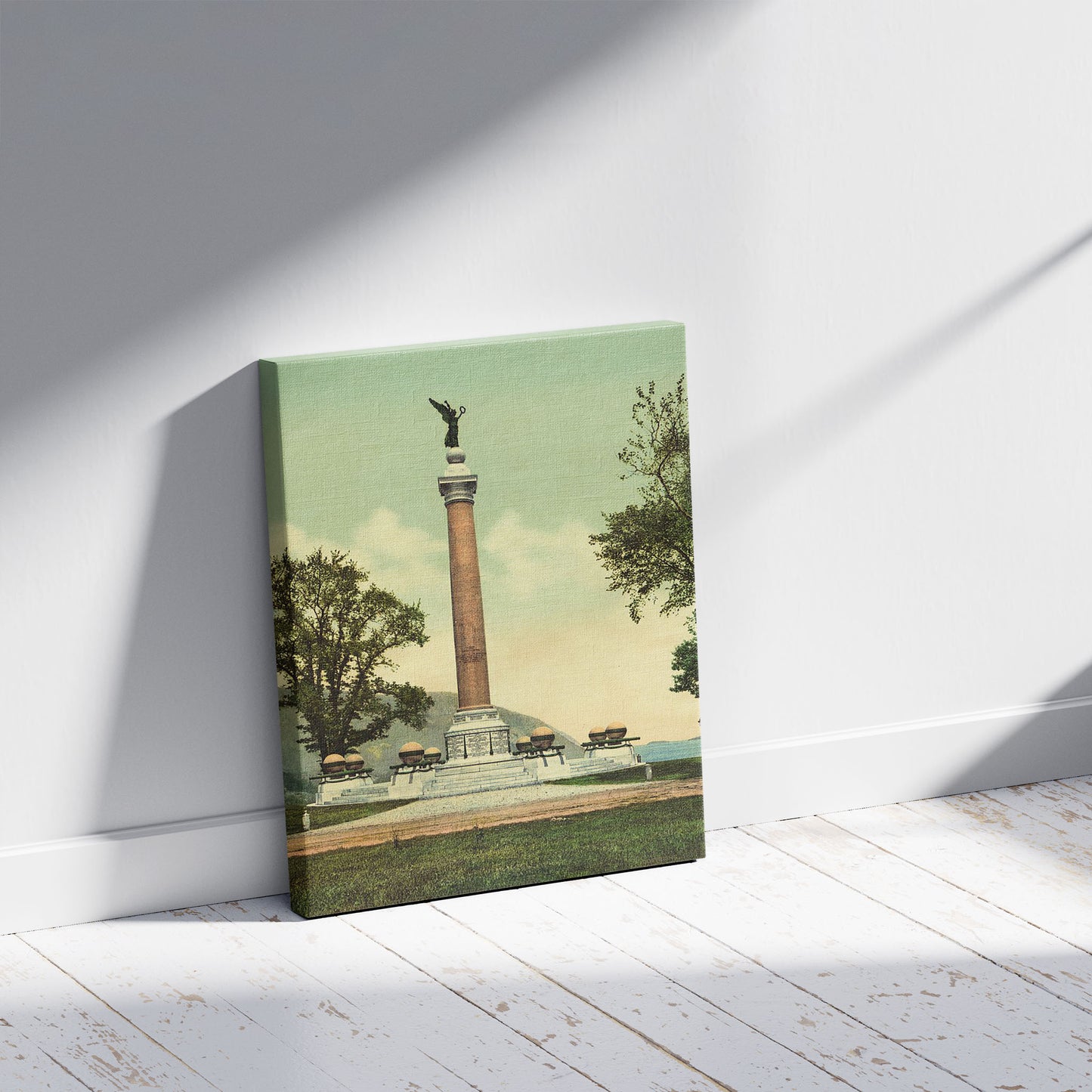 A picture of Battle monument, U.S. Military Academy, a mockup of the print leaning against a wall