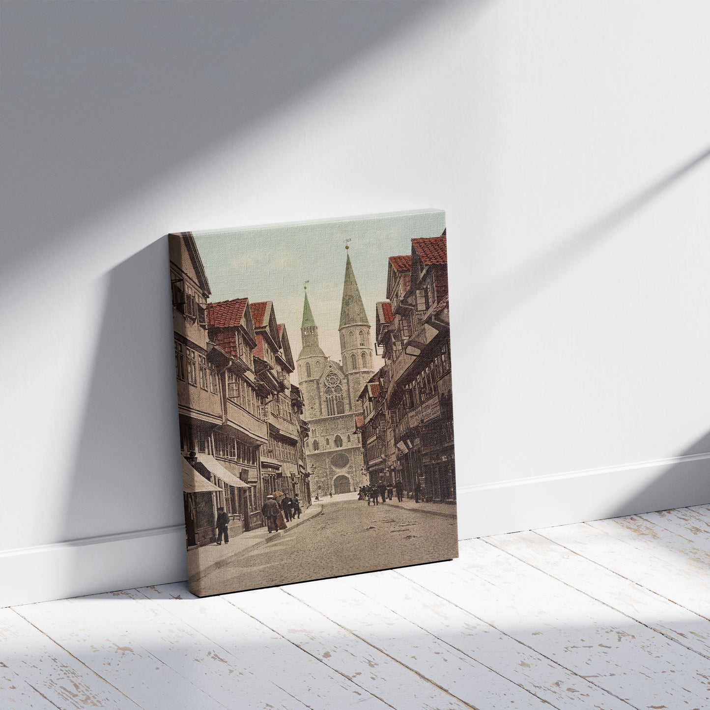 A picture of Braunschweig. Hagenbrücke und Katharinekirche, a mockup of the print leaning against a wall
