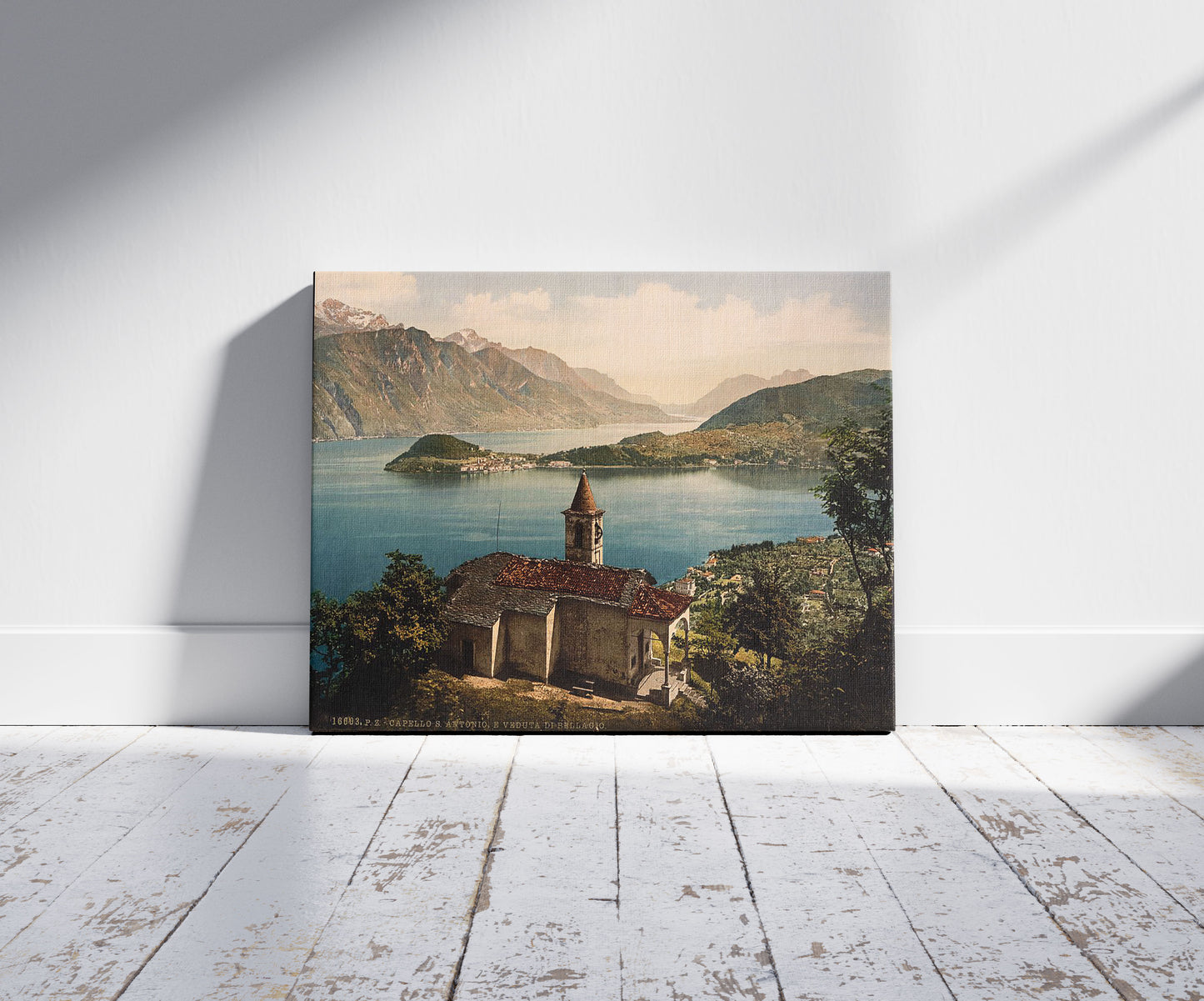 A picture of Capello St. Angelo and view of Bellagio, Lake Como, Italy, a mockup of the print leaning against a wall