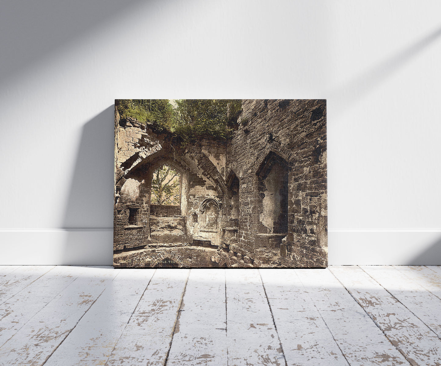A picture of Castle, the chapel, Goodrich, England, a mockup of the print leaning against a wall