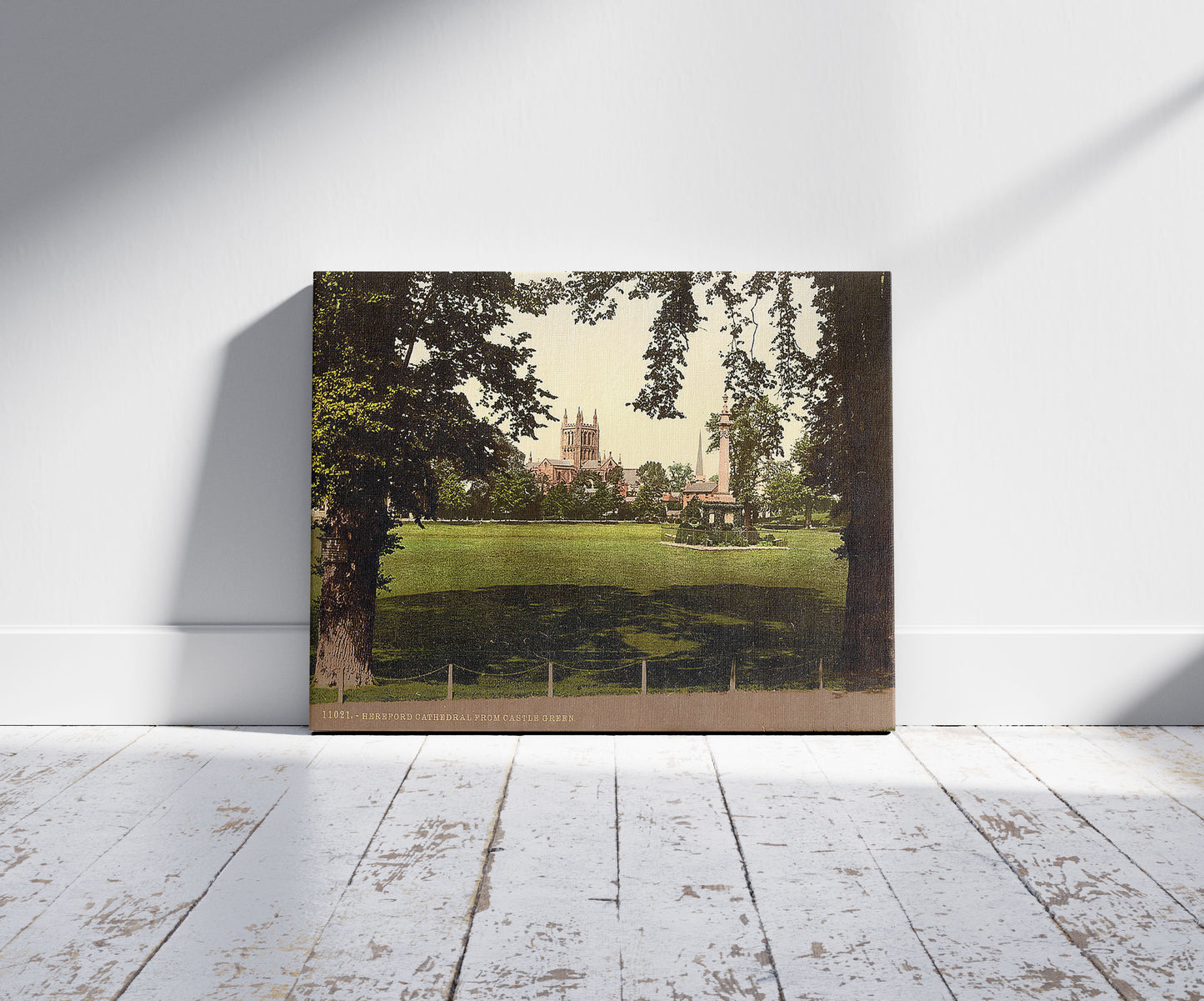 A picture of Cathedral from Castle Green, Hereford, England, a mockup of the print leaning against a wall
