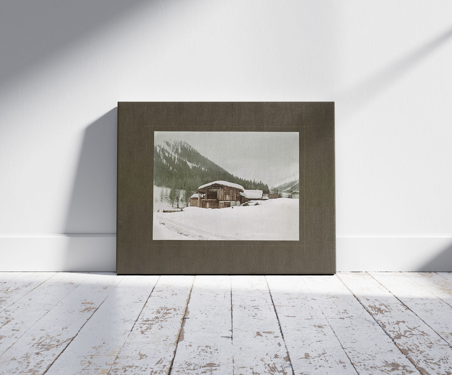 A picture of Chalet bei Davos, no. 1, a mockup of the print leaning against a wall
