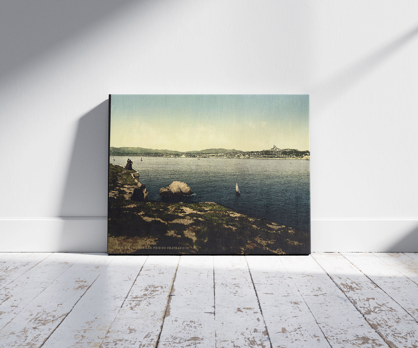 A picture of Chateau d'If, view from the chateau, Marseilles, France, a mockup of the print leaning against a wall