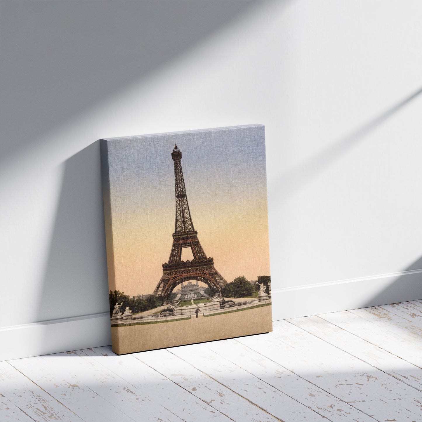 A picture of Eiffel Tower, full-view, looking toward the Palais du Trocadéro, Paris, France, a mockup of the print leaning against a wall