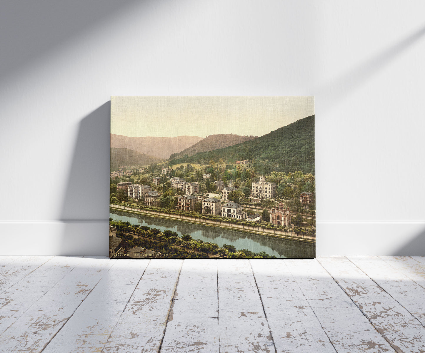 A picture of Ems-Les Bains (i.e., Bad Ems), Hesse-Nassau, Germany, a mockup of the print leaning against a wall