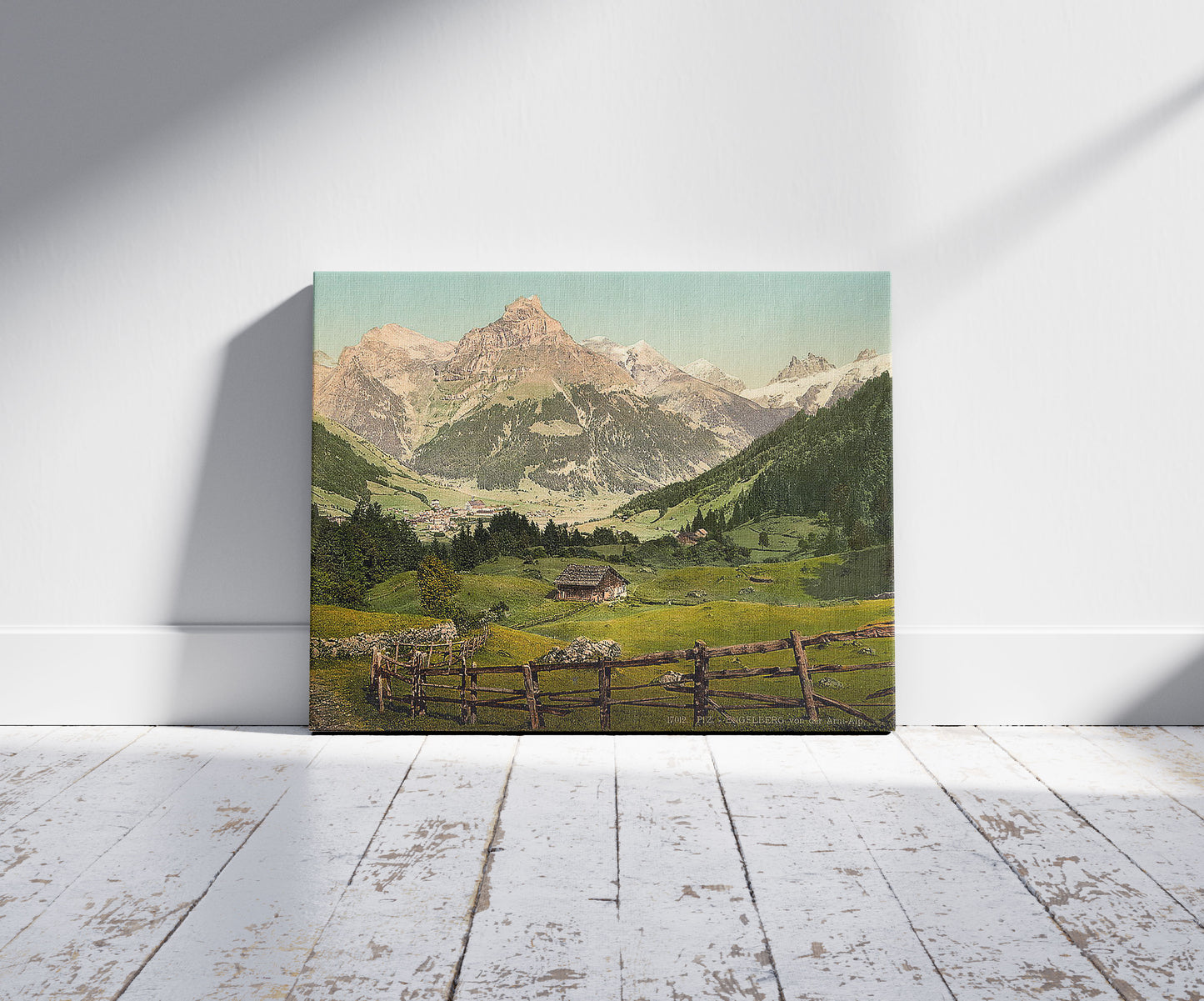 A picture of Engelberg Valley, Arni Alp, Bernese Oberland, Switzerland, a mockup of the print leaning against a wall