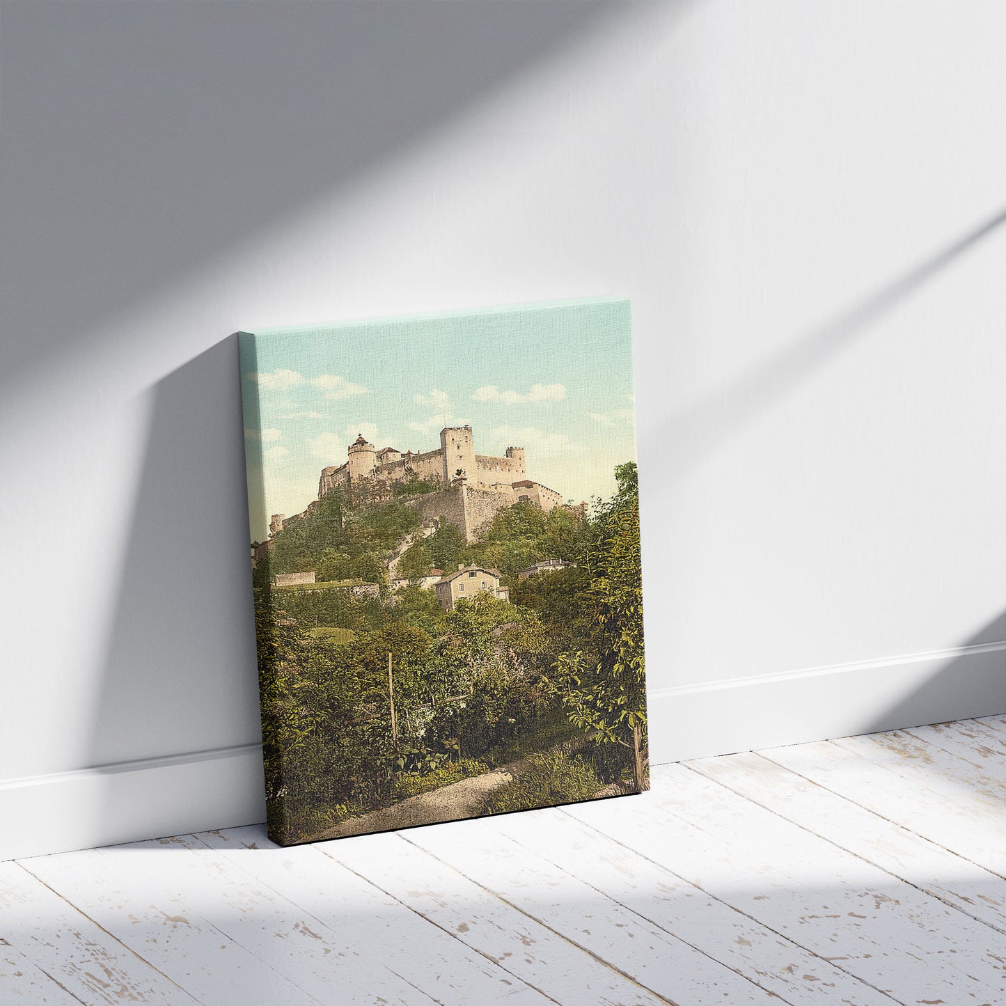A picture of Fortress High-Salzburg (i.e., Hohensalzburg), Salzburg, Austro-Hungary, a mockup of the print leaning against a wall