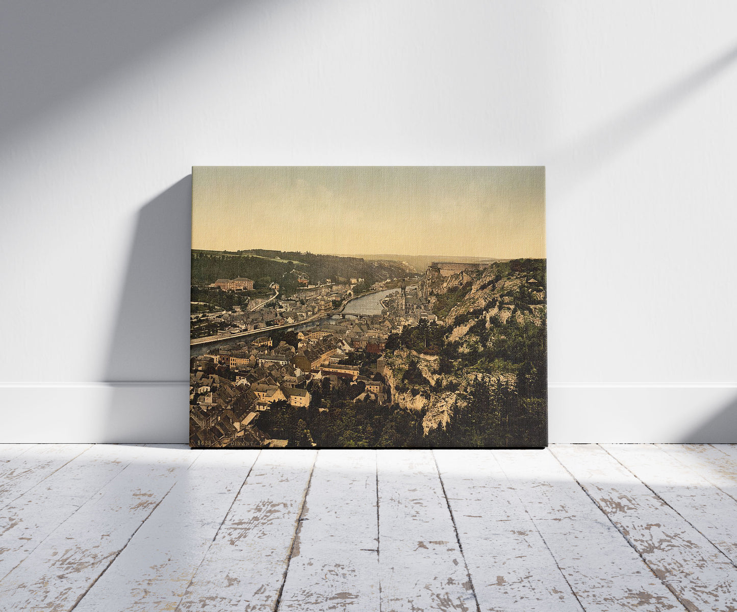 A picture of From the Casino garden, Dinant, Belgium, a mockup of the print leaning against a wall
