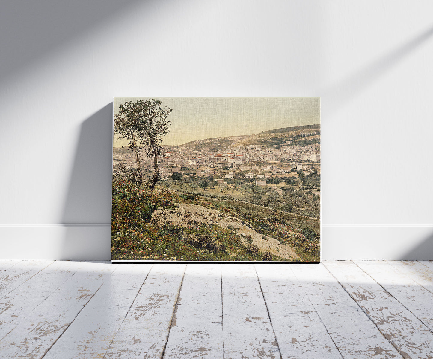 A picture of From the east, Nazareth, Holy Land, (i.e., Israel), a mockup of the print leaning against a wall