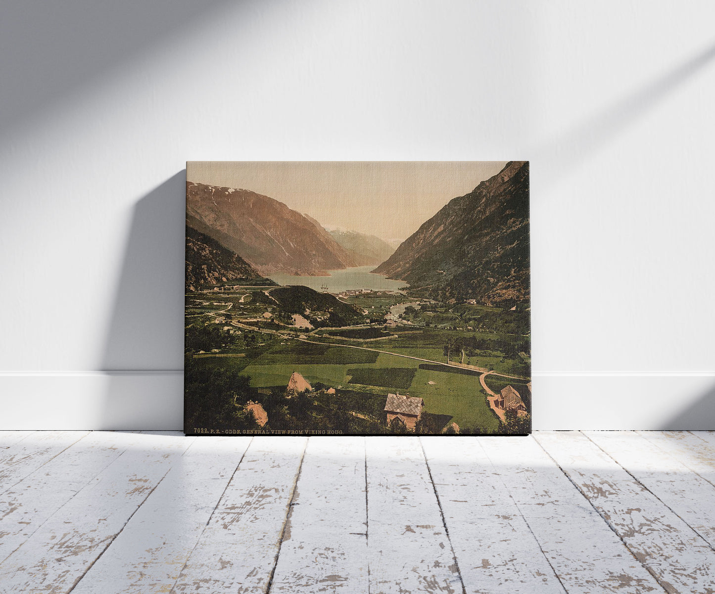 A picture of From Vikinghaug, Odde (i.e. Odda), Hardanger Fjord, Norway, a mockup of the print leaning against a wall