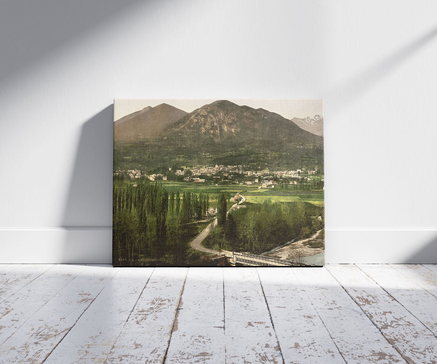 A picture of General view, Argelès, Pyrenees, France, a mockup of the print leaning against a wall