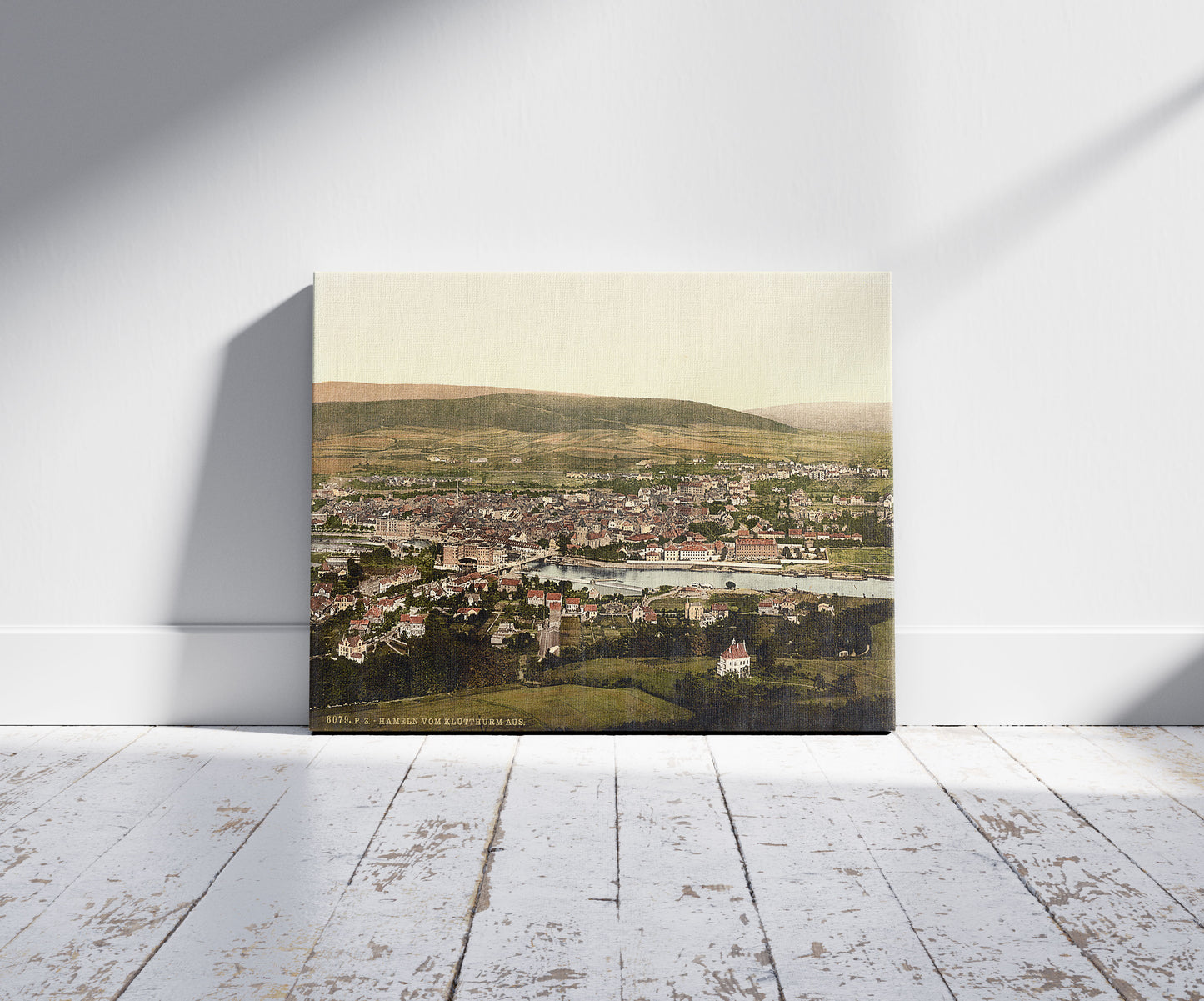A picture of General view, Hameln, Hanover, Germany, a mockup of the print leaning against a wall