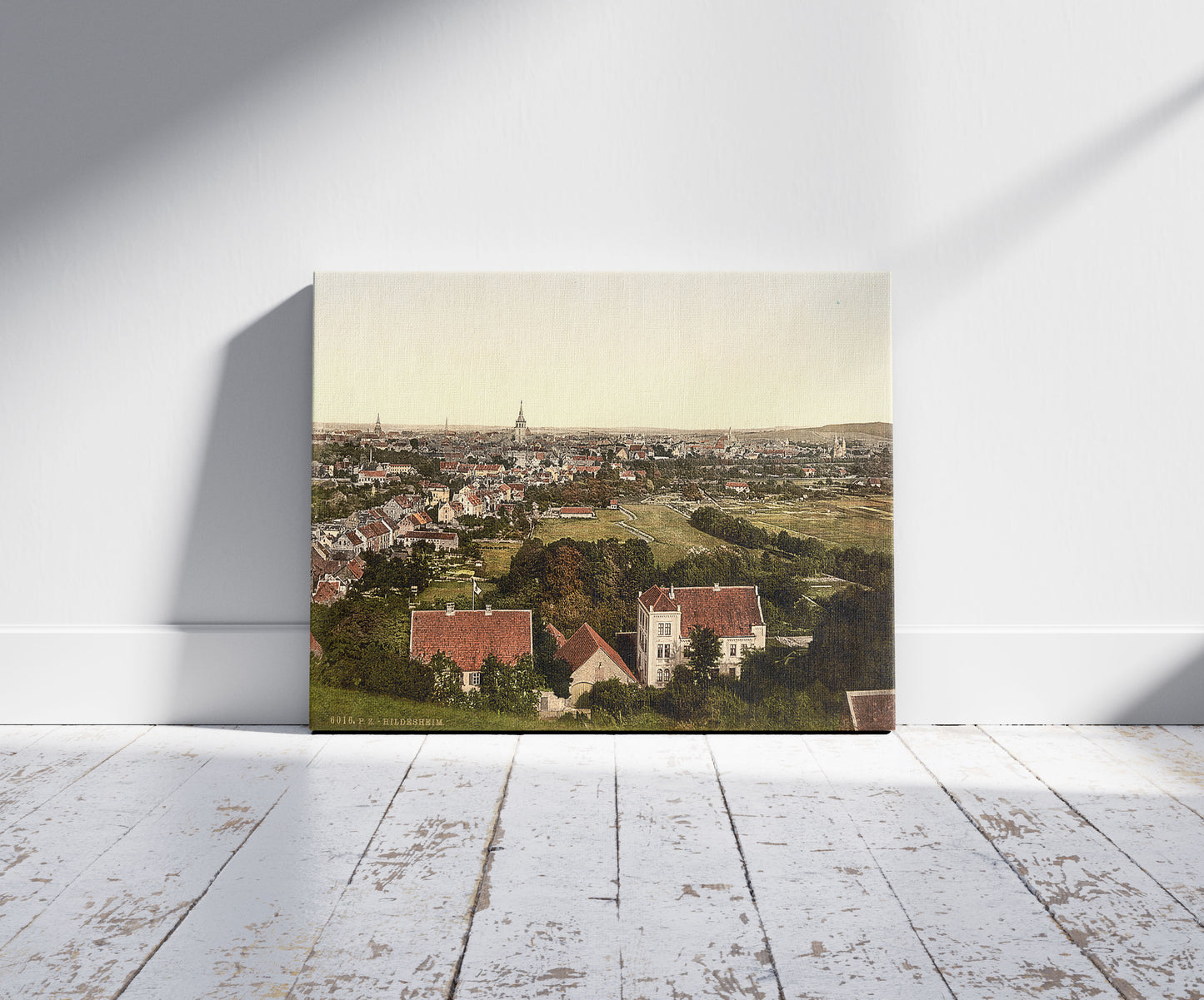 A picture of General view, Hildesheim, Hanover, Germany, a mockup of the print leaning against a wall