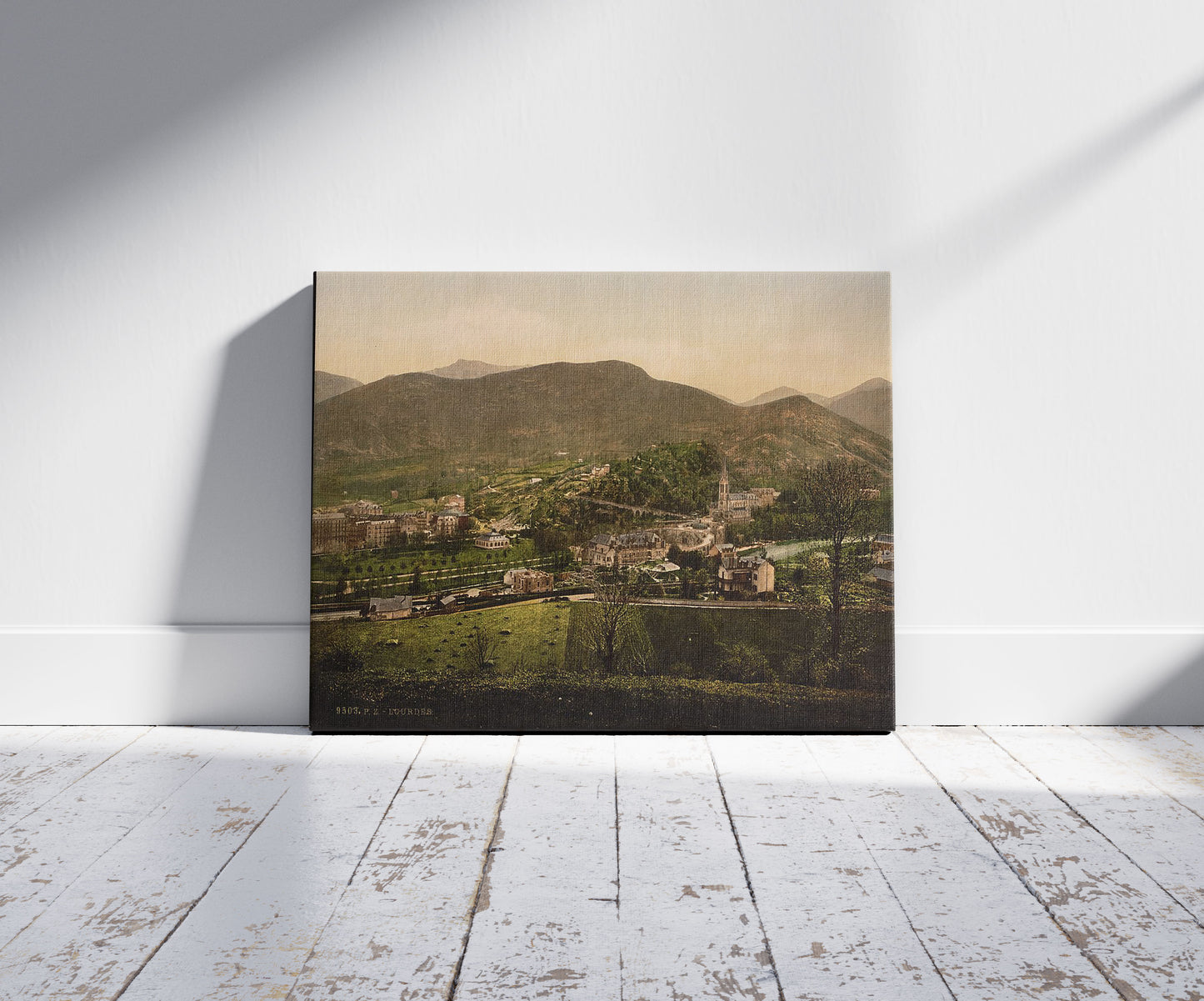 A picture of General view, Lourdes, Pyrenees, France, a mockup of the print leaning against a wall