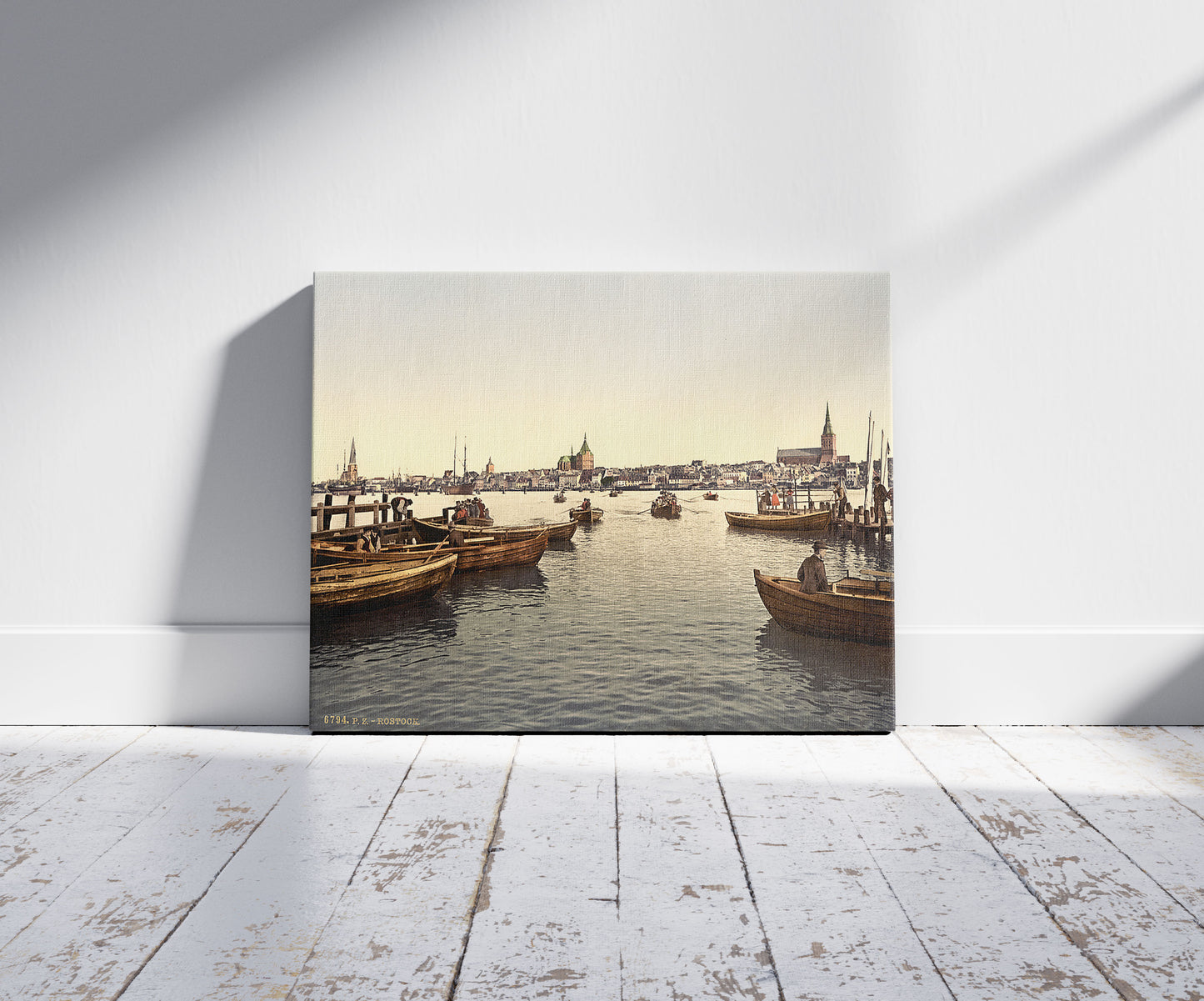 A picture of General view, Rostock, Mecklenburg-Schwern, Germany, a mockup of the print leaning against a wall