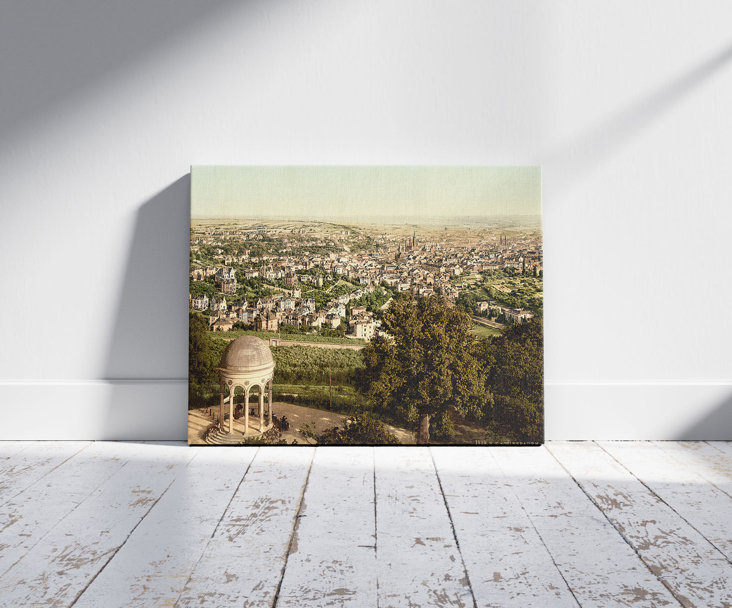 A picture of General view, Wiesbaden, Hesse-Nassau, Germany, a mockup of the print leaning against a wall