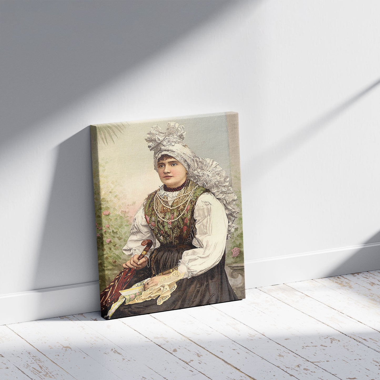 A picture of Girls in native costume, Carniola, Austro-Hungary, a mockup of the print leaning against a wall