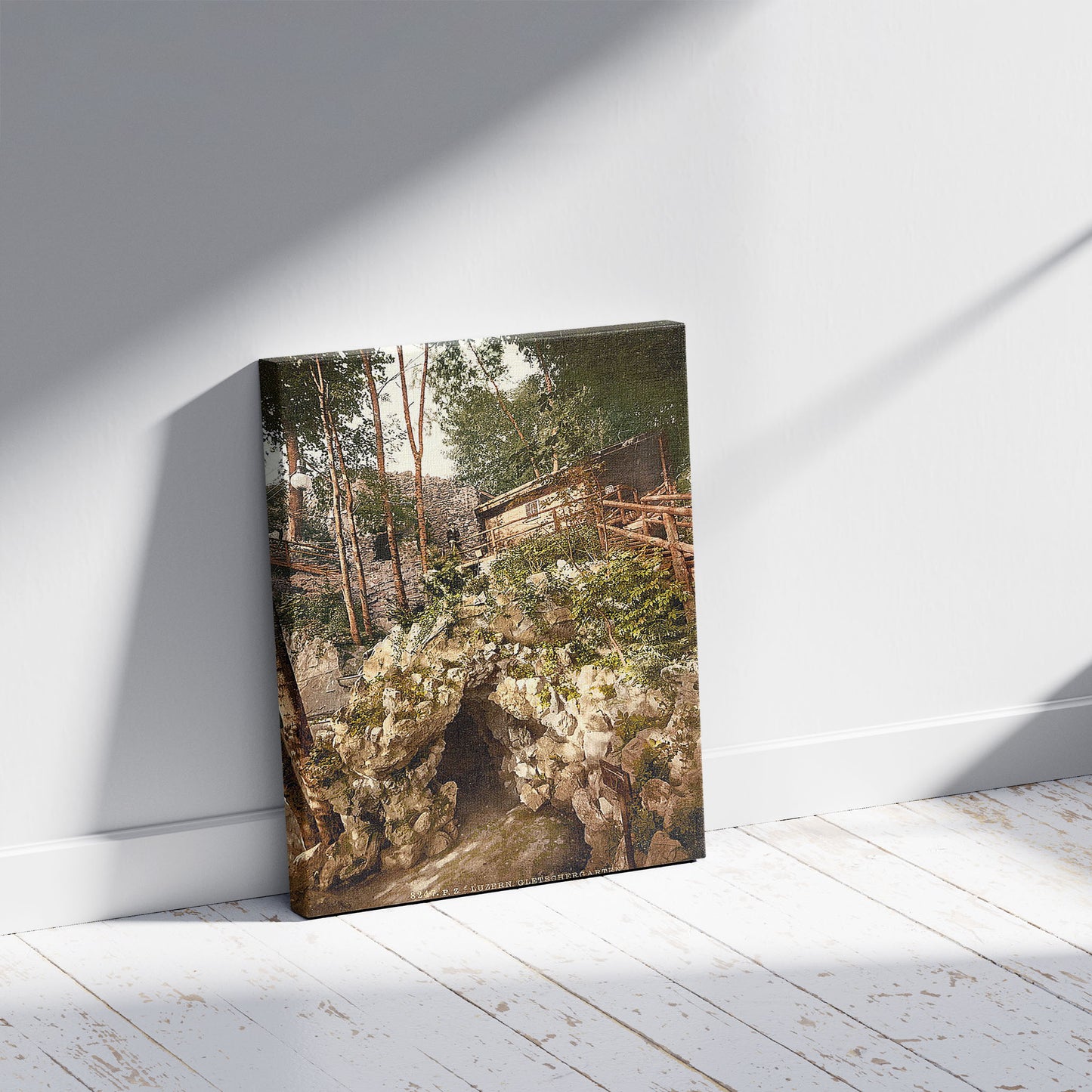 A picture of Glacier garden, the grotto and club house, Lucerne, Switzerland, a mockup of the print leaning against a wall