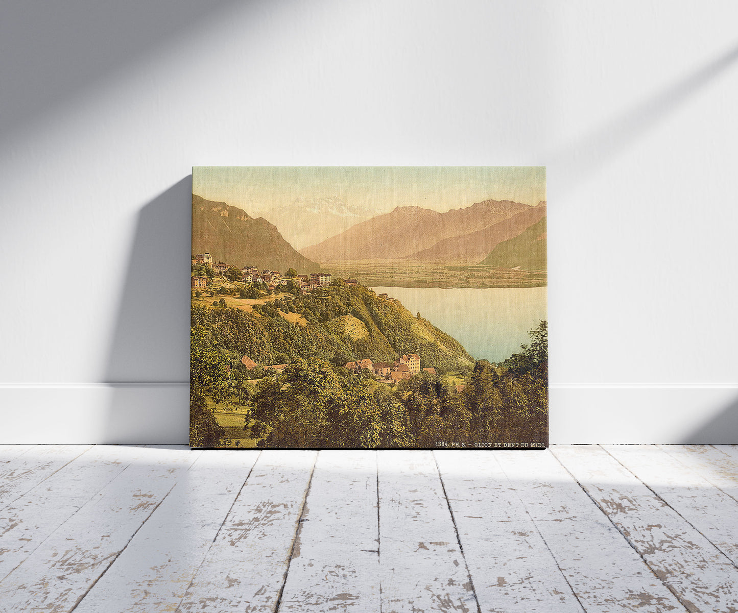 A picture of Glion and Dent du Midi, Geneva Lake, Switzerland, a mockup of the print leaning against a wall