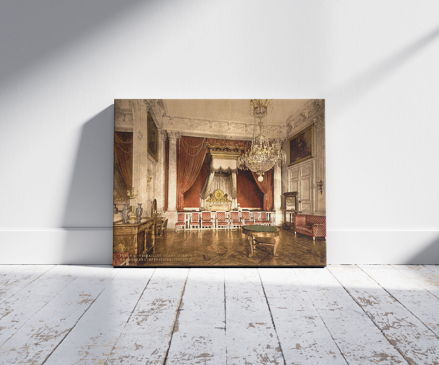 A picture of Grand Trianon, chamber of Empress Josephine, Versailles, France, a mockup of the print leaning against a wall
