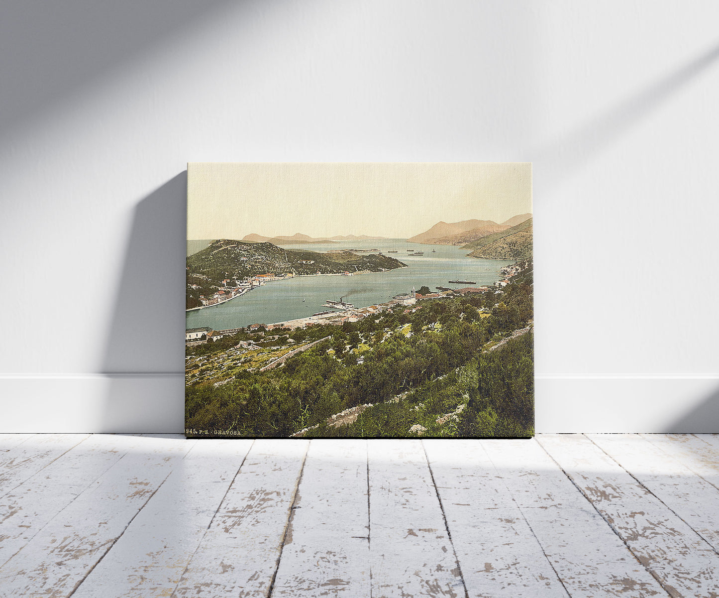 A picture of Gravosa, general view, Dalmatia, Austro-Hungary, a mockup of the print leaning against a wall