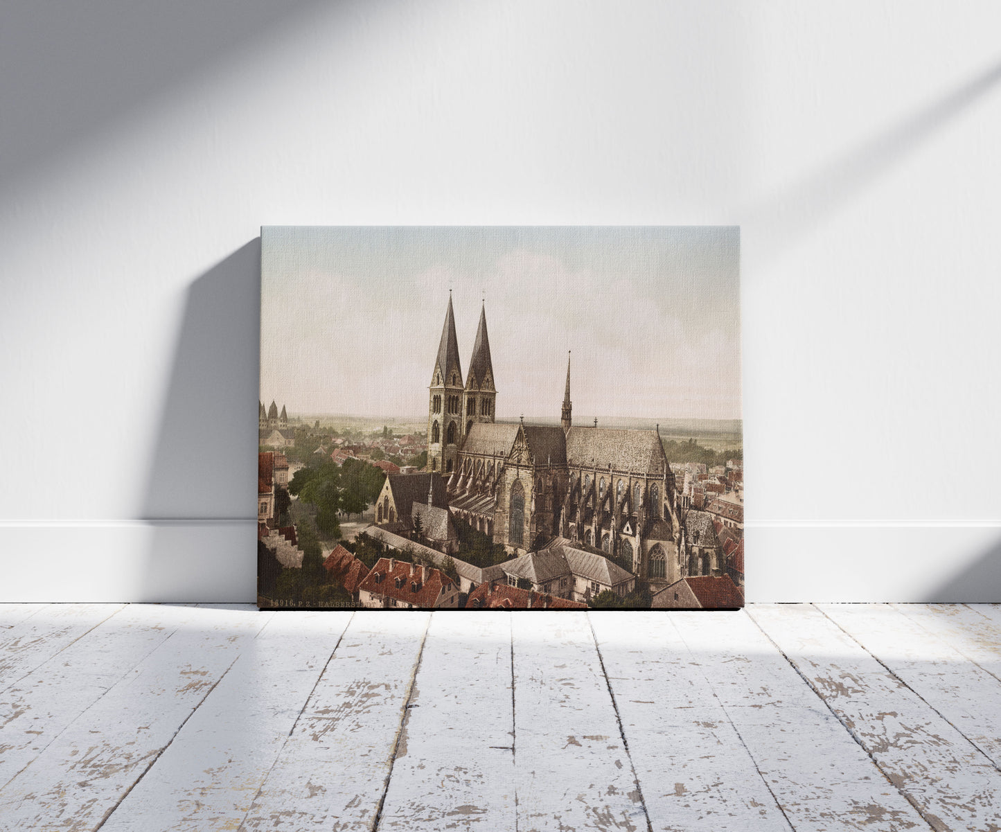 A picture of Halberstadt A. Harz. der Dom, a mockup of the print leaning against a wall