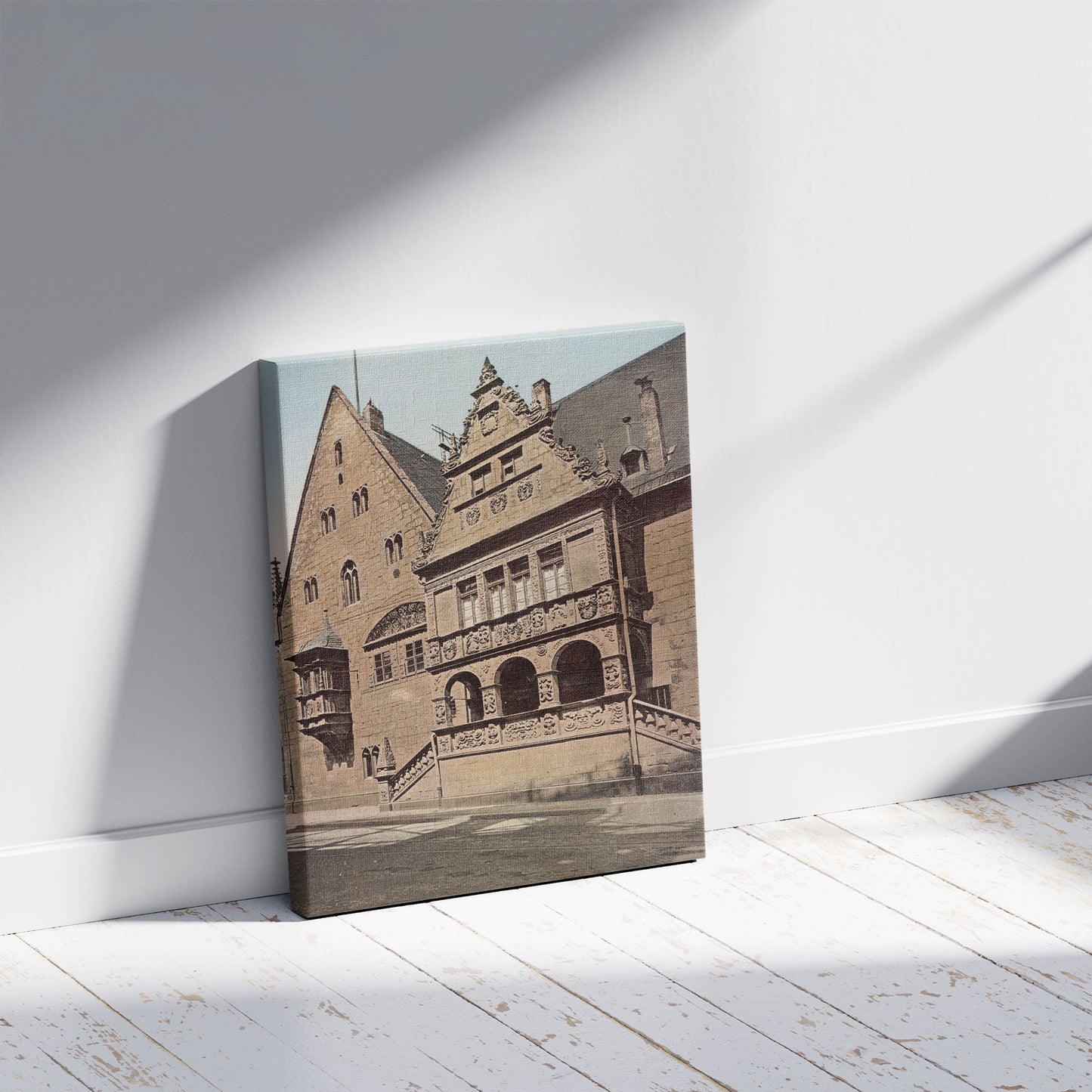 A picture of Halberstadt. Rathaus - Detail, a mockup of the print leaning against a wall