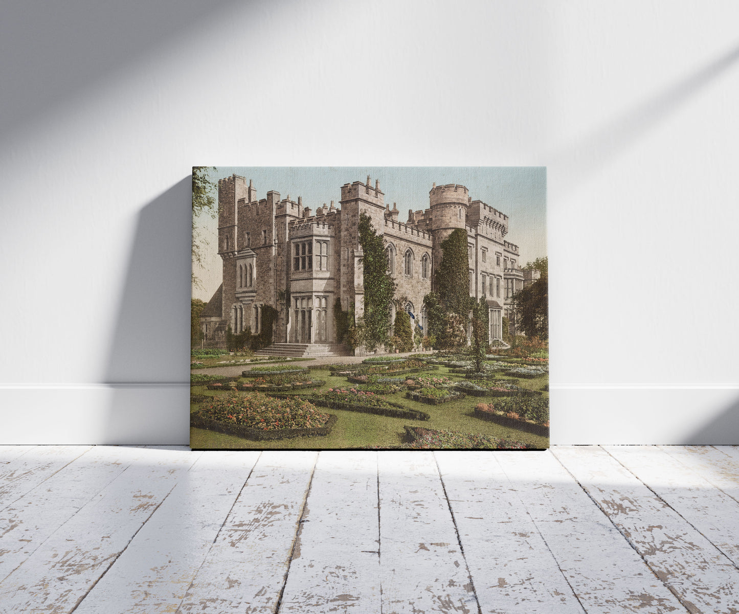 A picture of Hawarden Castle, a mockup of the print leaning against a wall