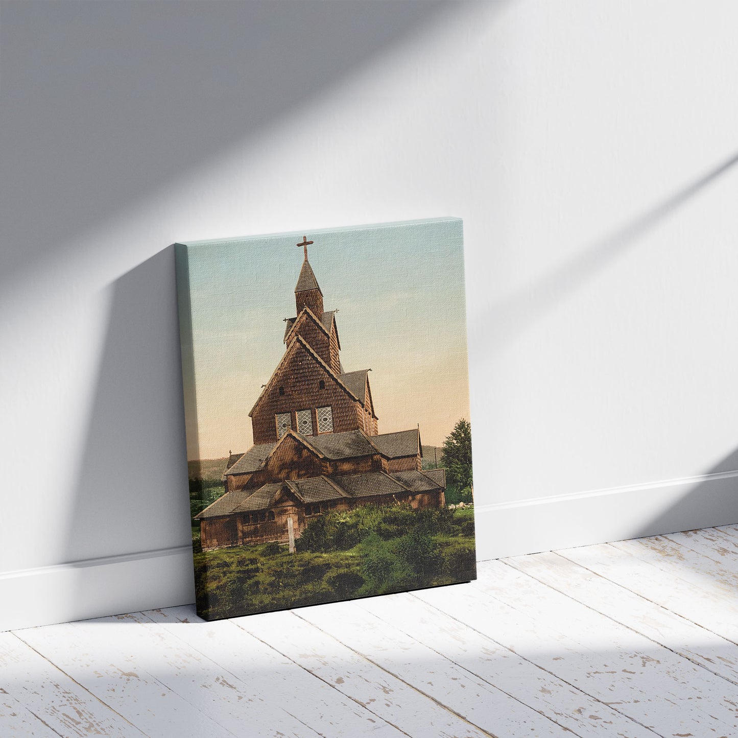 A picture of Hitterdals Church, Telemarken (i.e, Telemark), Norway, a mockup of the print leaning against a wall