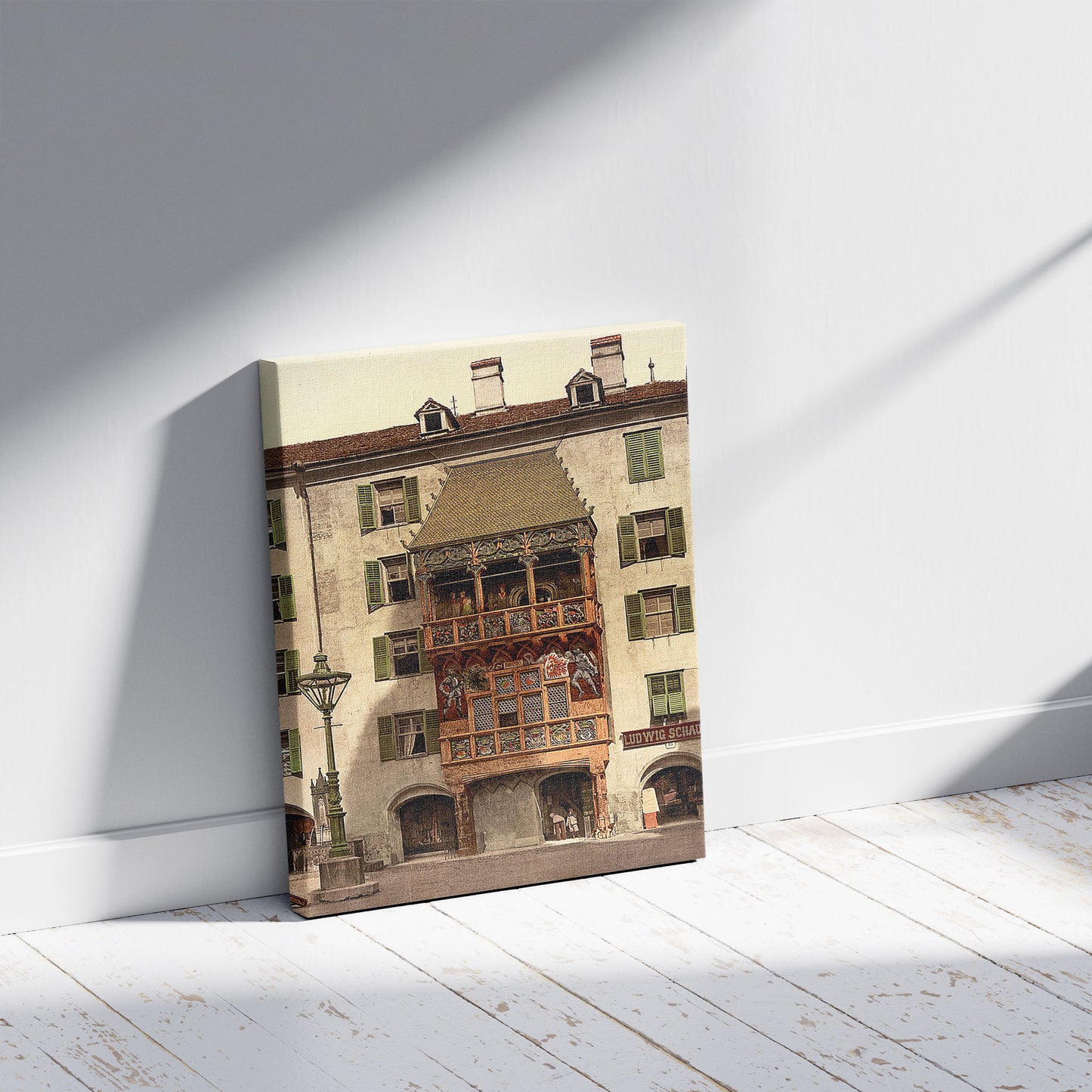 A picture of Innsbruck, the Golden Porch, Tyrol, Austro-Hungary, a mockup of the print leaning against a wall