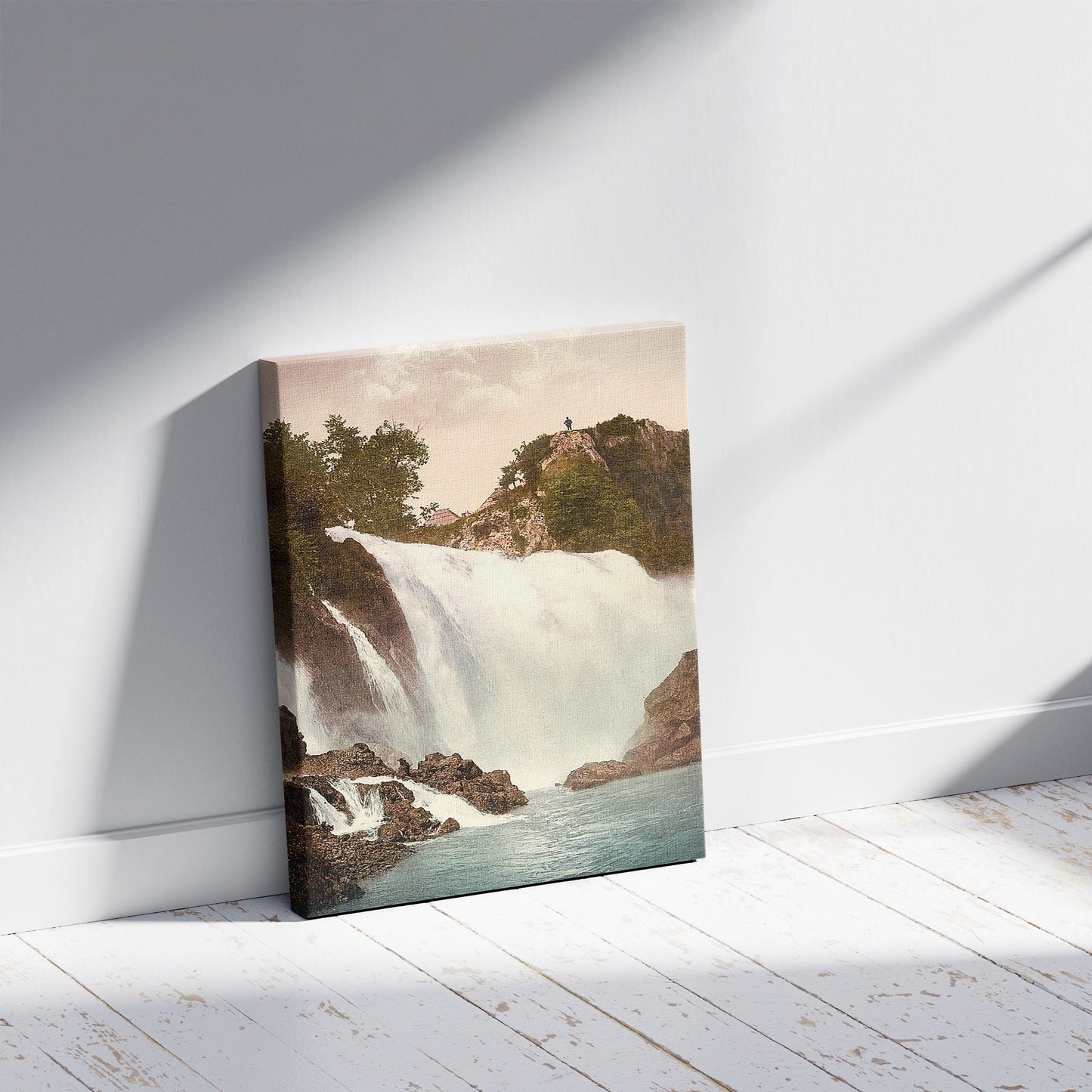 A picture of Jajce, a waterfall, Bosnia, Austro-Hungary, a mockup of the print leaning against a wall