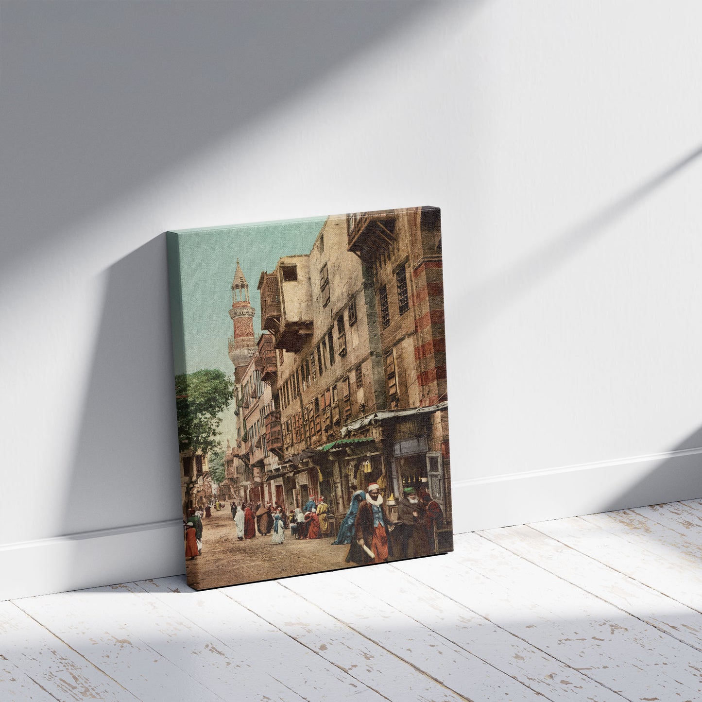 A picture of Kairo, Rue au Quartier Arabe, a mockup of the print leaning against a wall