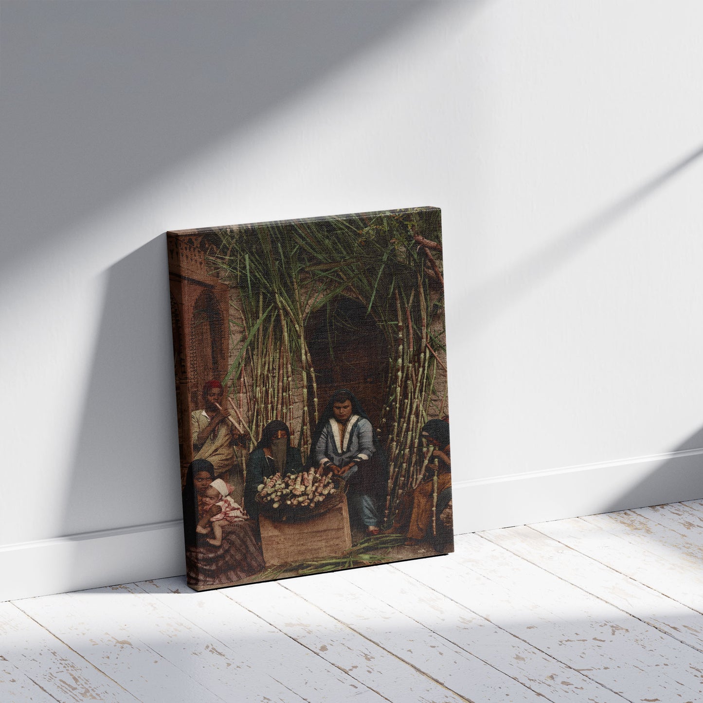 A picture of Kairo. Vendeuses de cannes à sucre, a mockup of the print leaning against a wall