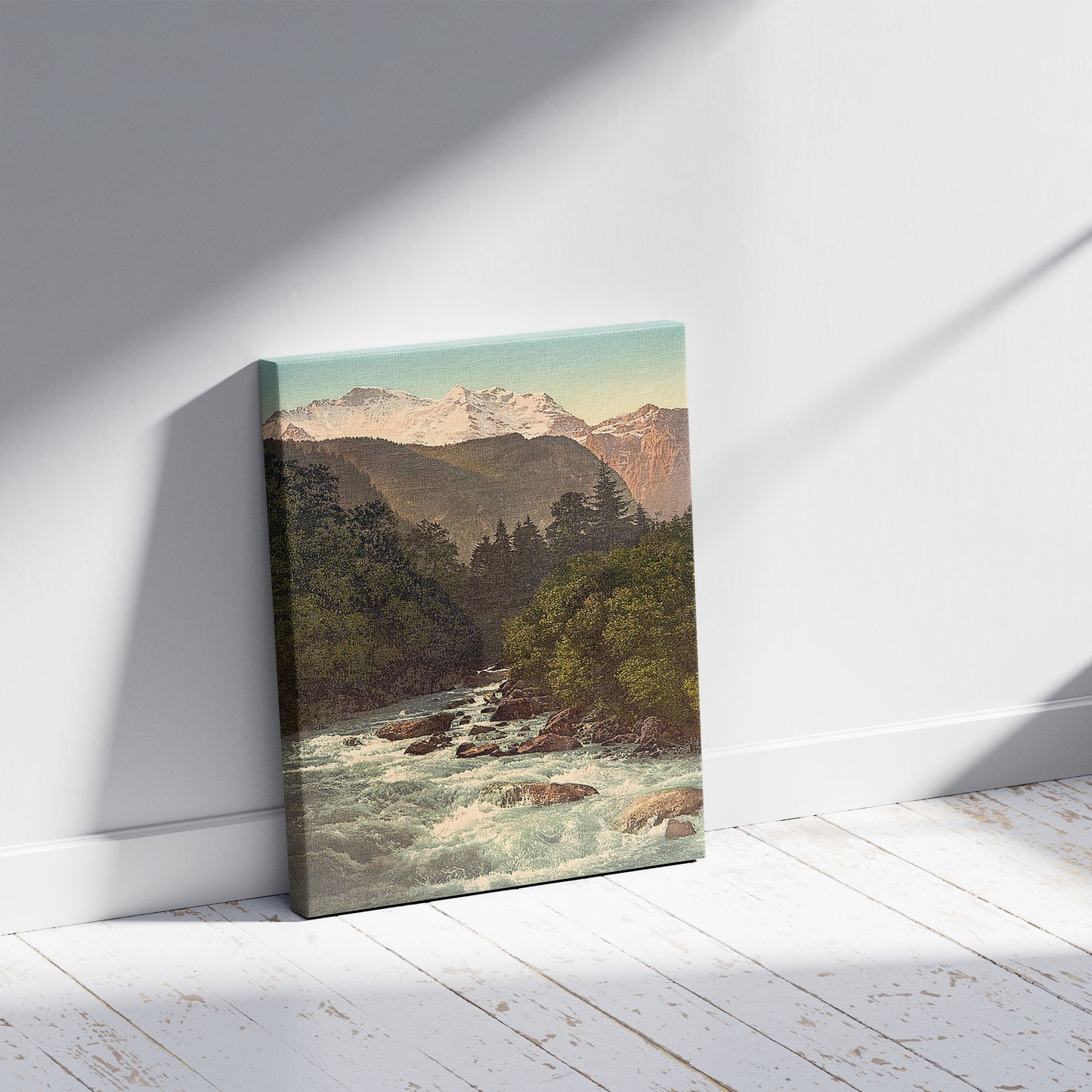 A picture of Lauterbrunnen Valley, Jungfrau and White Lutschine, Bernese Oberland, Switzerland, a mockup of the print leaning against a wall