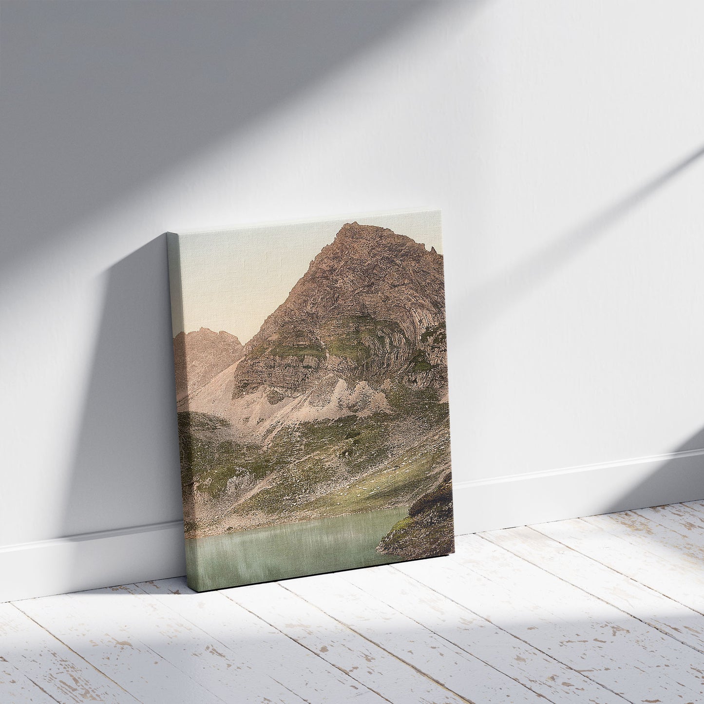 A picture of Lermoos, the Drachensee, Tyrol, Austro-Hungary, a mockup of the print leaning against a wall
