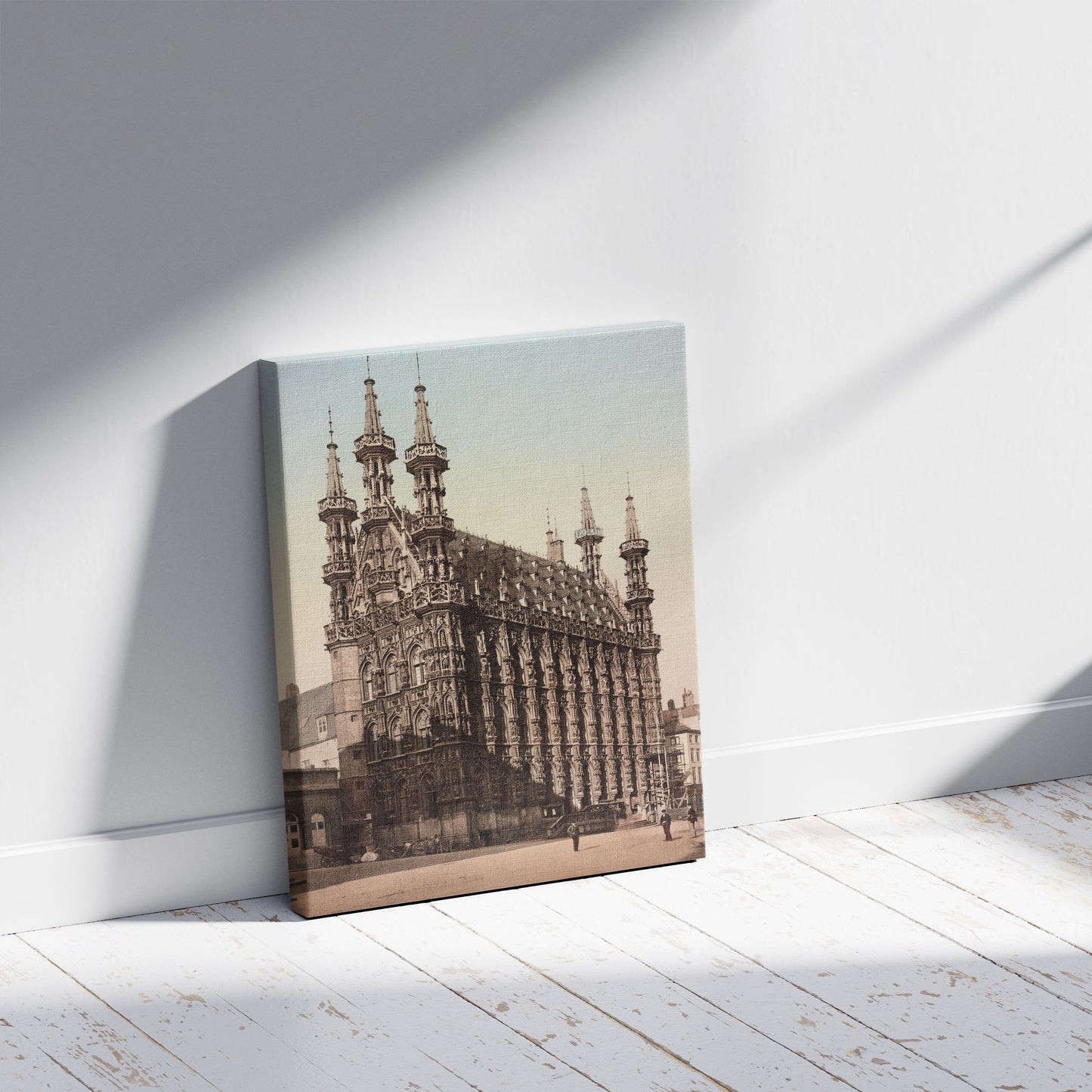 A picture of Louvain. L'Hôtel de Ville, a mockup of the print leaning against a wall