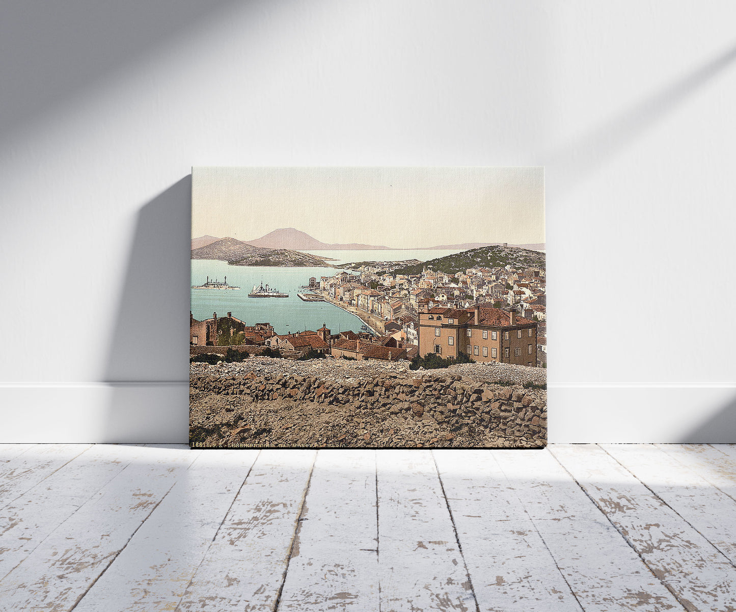 A picture of Lussin-Piccolo (i.e., Lussinpiccolo), from Monte Calavario, Istria, Austro-Hungary, a mockup of the print leaning against a wall