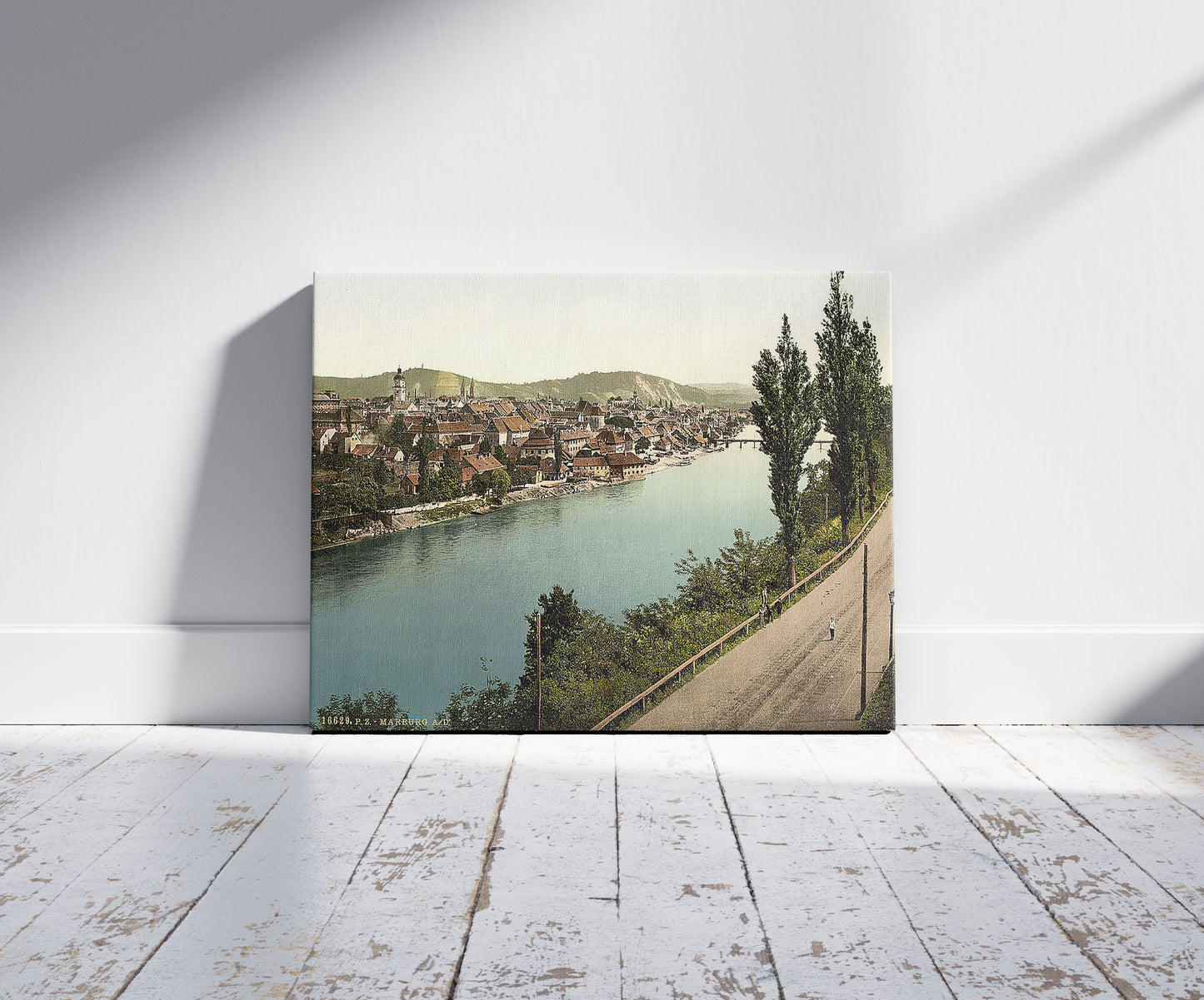 A picture of Marburg (i.e., Maribor), general view, Styria, Austro-Hungary, a mockup of the print leaning against a wall
