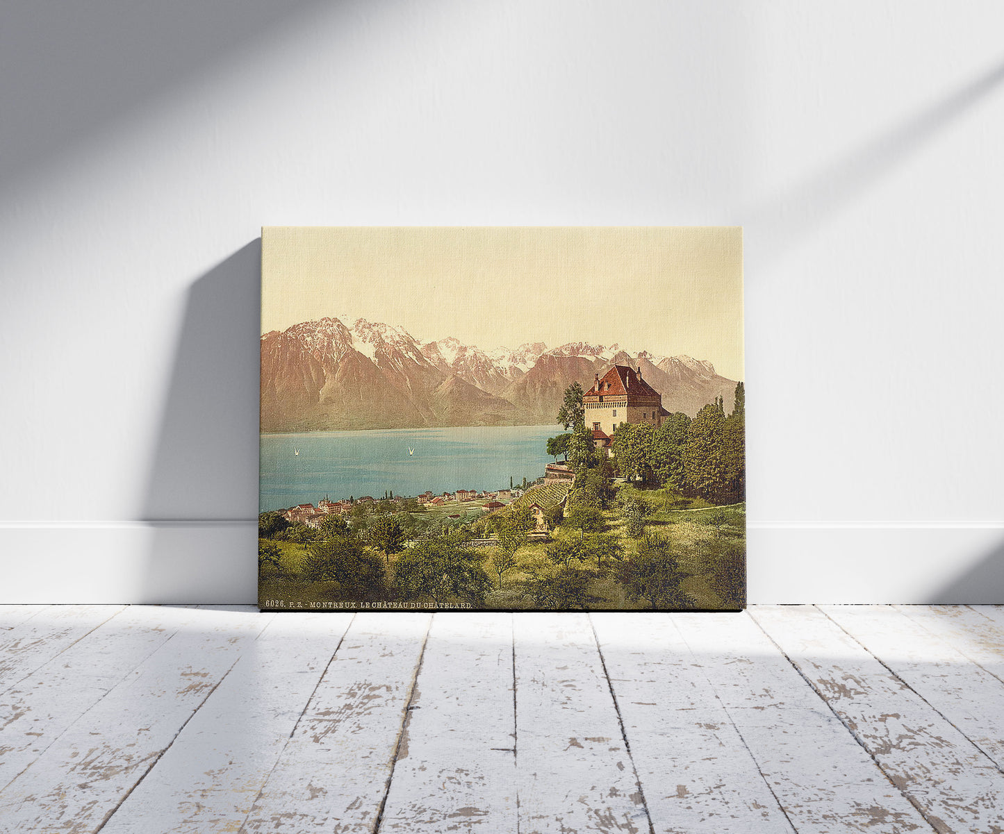 A picture of Montreux, Chatelard Castle, Geneva Lake, Switzerland, a mockup of the print leaning against a wall