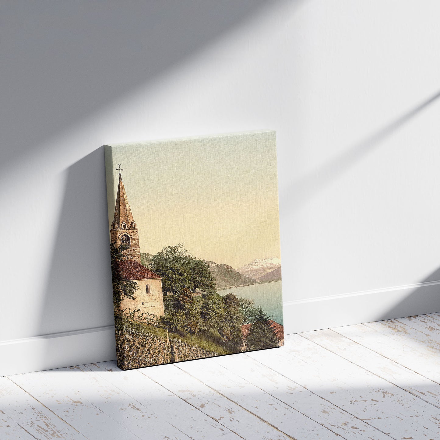 A picture of Montreux, the church and Dent du Midi, Geneva Lake, Switzerland, a mockup of the print leaning against a wall