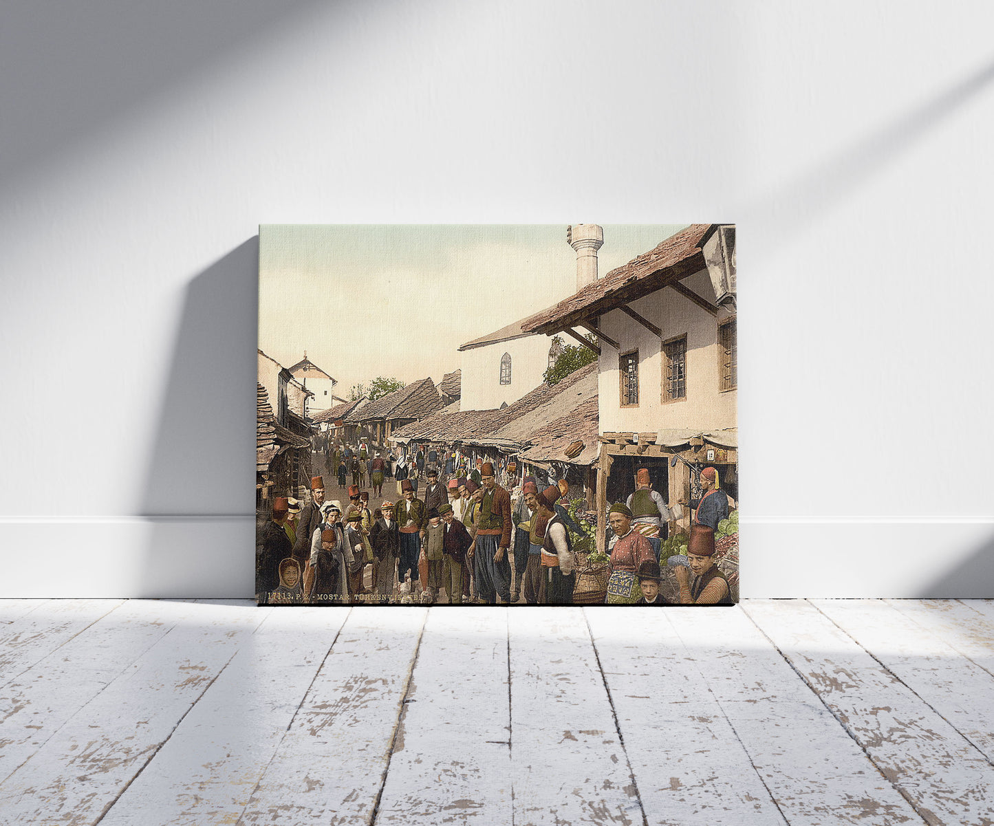 A picture of Mostar, Türken Viertel, a mockup of the print leaning against a wall