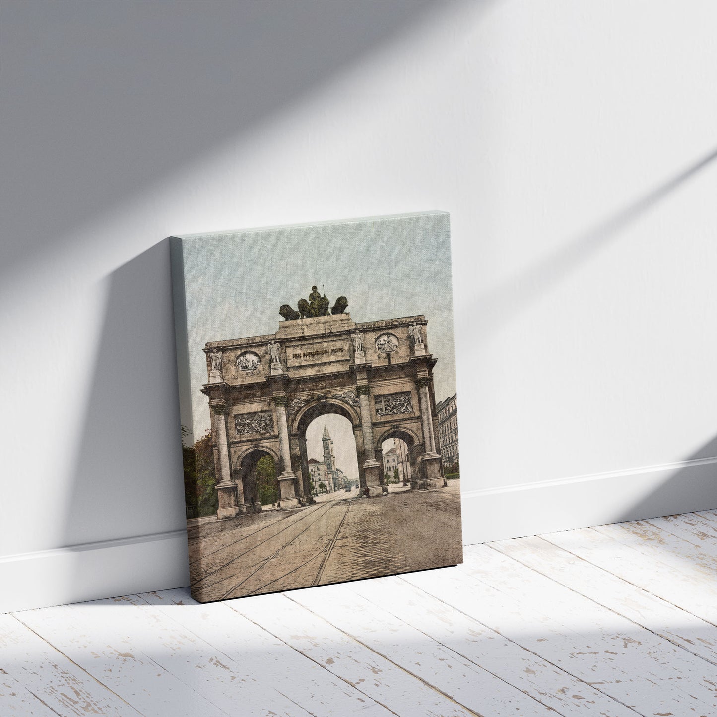 A picture of München. Siegestor, a mockup of the print leaning against a wall